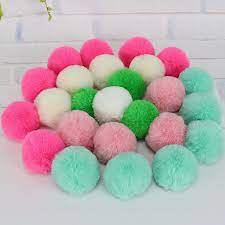 Pompons diam 5cm coloris variés, vendus à l'unité