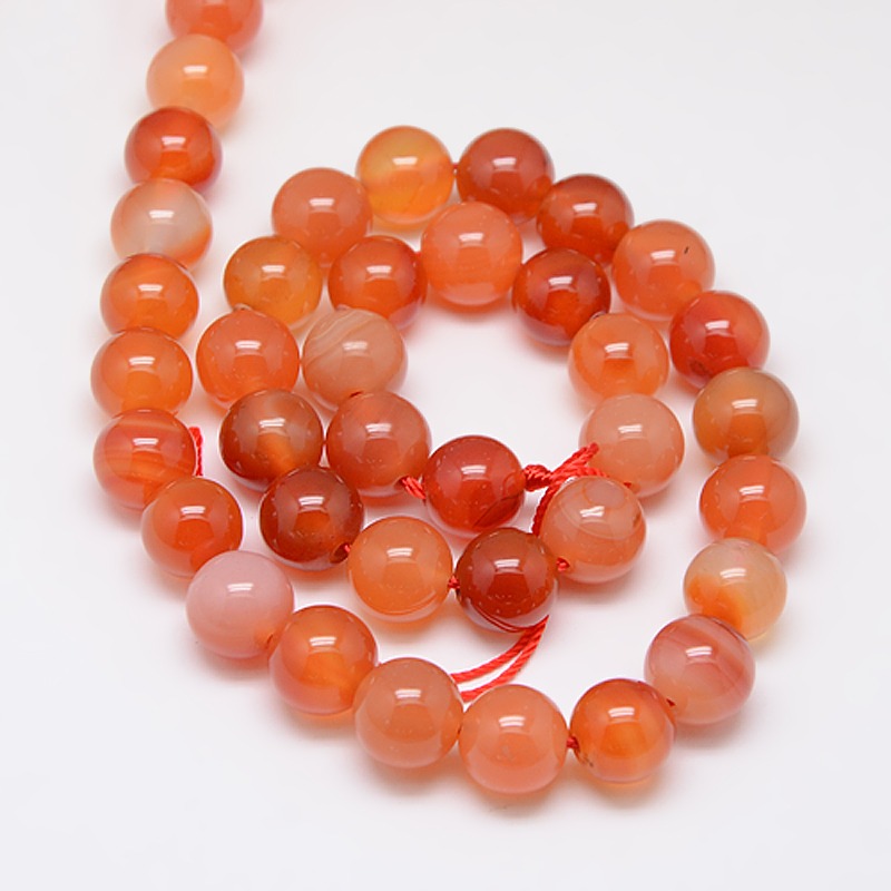 Pierre Cornaline naturelle orange grade A, ronde, 10mm, trou 1mm