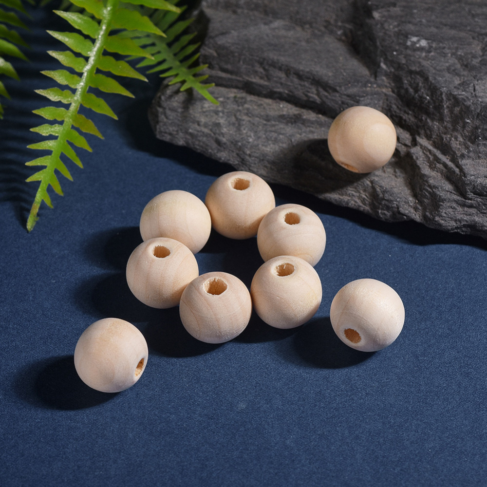 Perle en bois naturel, boule, diamètre 12mm, trou env. 3mm, l'unité
