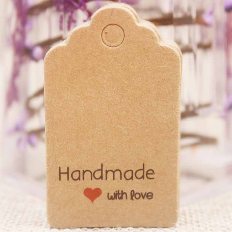 Etiquettes en carton "handmade with love", kraft, rectangle 50x30x0,4mm, trou 5mm x 10 pcs