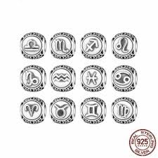 [1580] Cache noeud INOX argenté, motifs zodiaque; diam 9mm trou 4mm