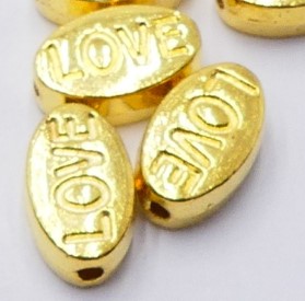 Perle laiton coloris mixtes, ovale inscrite LOVE, 10x6x4mm trou 1mm